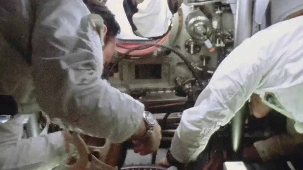 Edgar Mitchell wearing Rolex watch in space